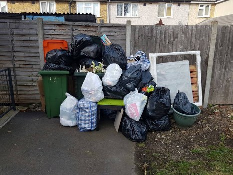 Muck away service team removing waste in Chiswick