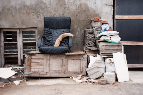 Enclosed and lockable skip placed on a residential property in Chiswick