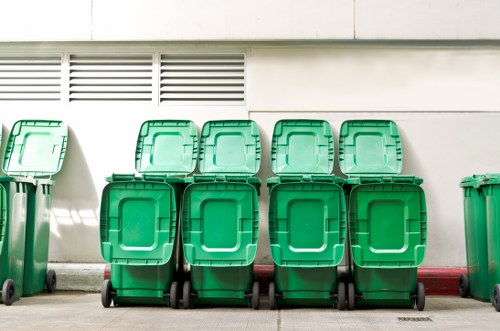 Secure skip with covered doors protecting waste from the elements