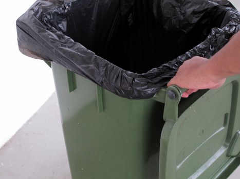 A mini skip placed on a residential property in Chiswick