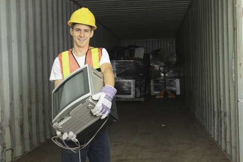 Friendly staff assisting with skip hire in Chiswick